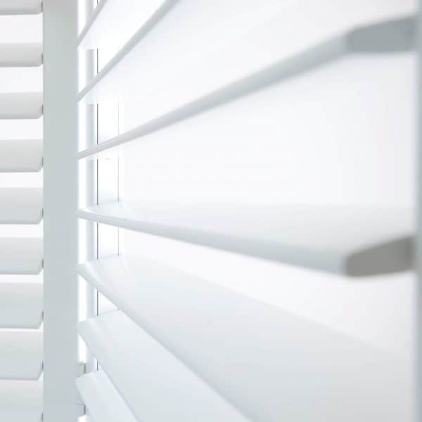 White wooden plantation shutter blinds